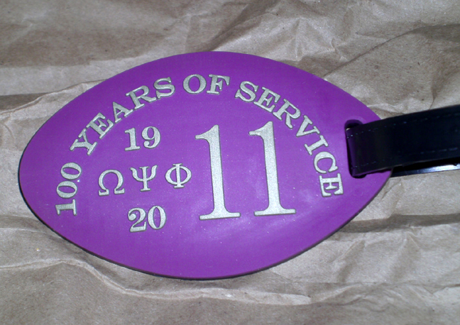 Omega_Oval_Centennial_Luggage_Tag.jpg